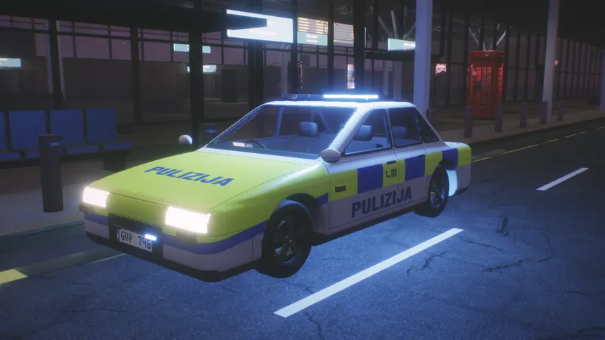 A Pulizija car at night with its blue lights
